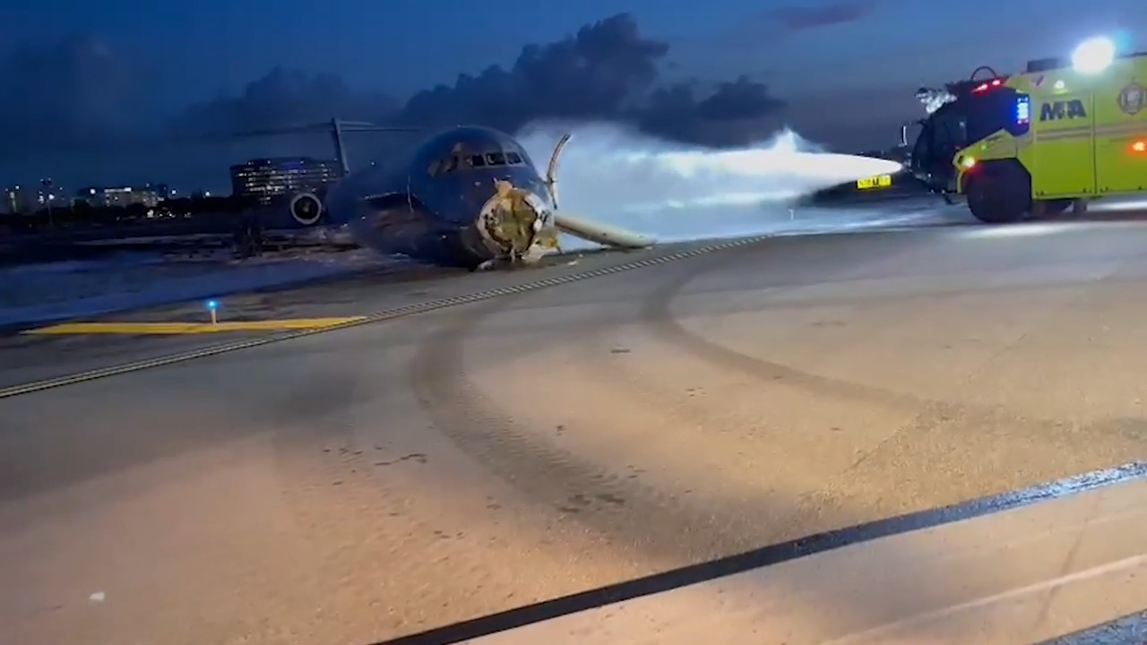 Photos, videos: A look at the aftermath of Miami International Airport plane crash
