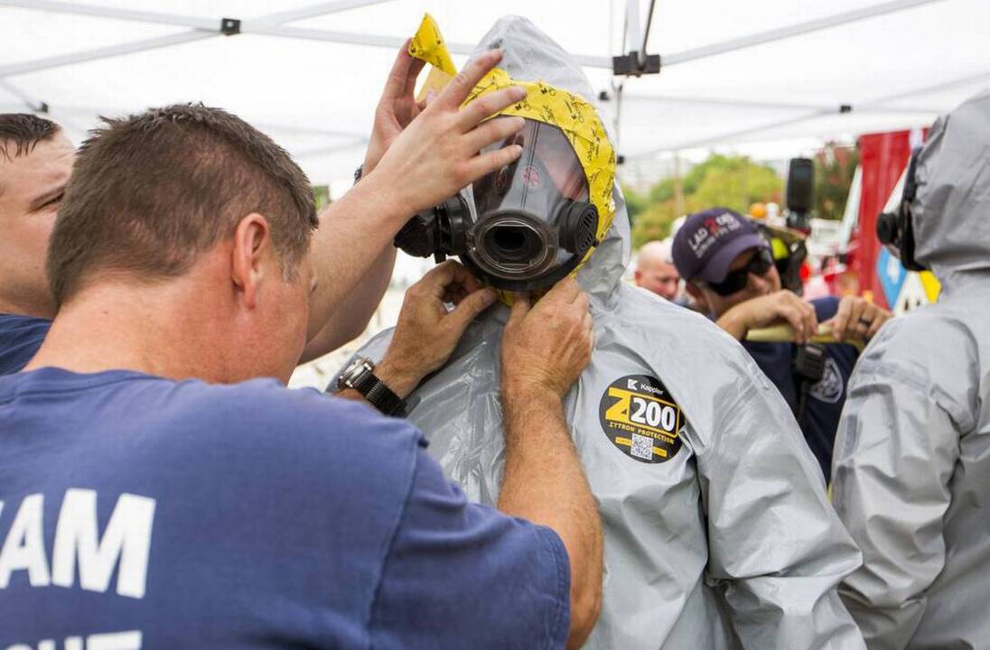 YMCA response to spill questioned. Witnesses say ‘hacking, coughing’ kids put on buses