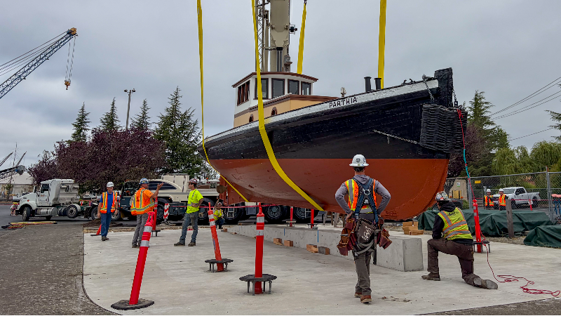 Historic Parthia tugboat hoisted to Port of Olympia display