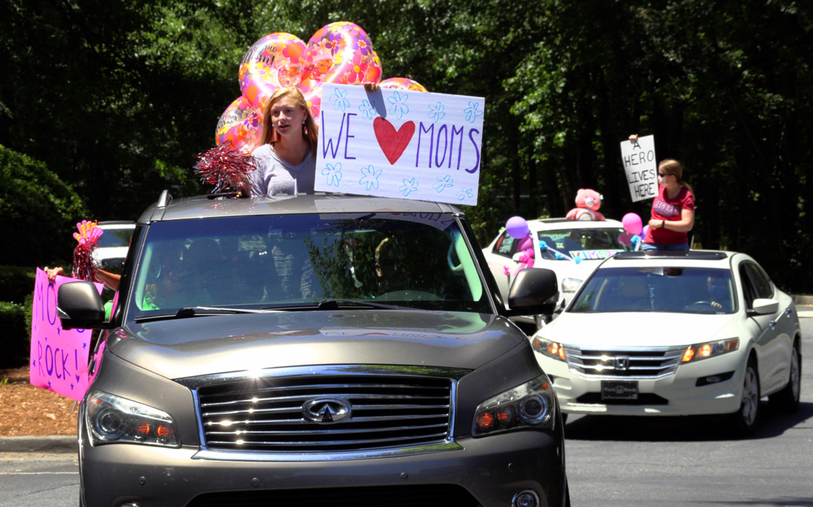 ‘Care-A-Van’ brings smiles, cheer to Columbus senior living community on Mother’s Day