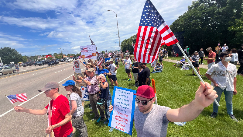 No Kings protesters line part of Raleigh's Capital Blvd.