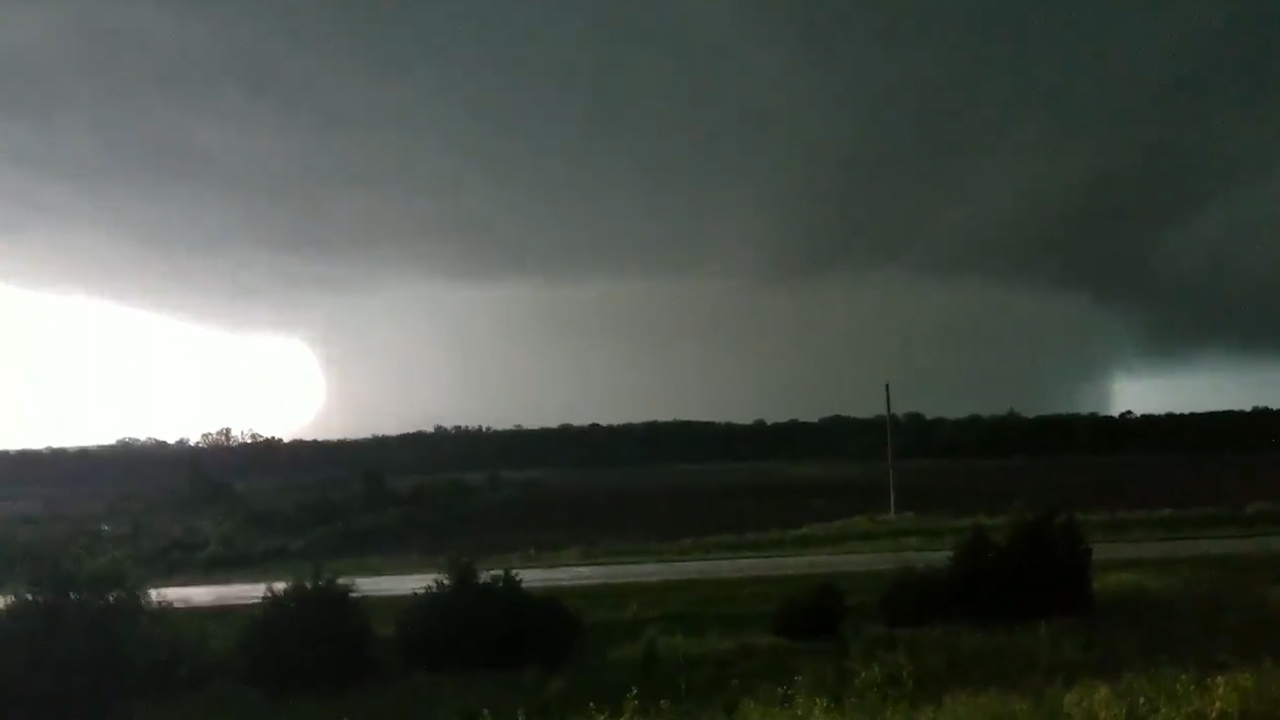 Massive rain-wrapped tornado passes south of Lawrence