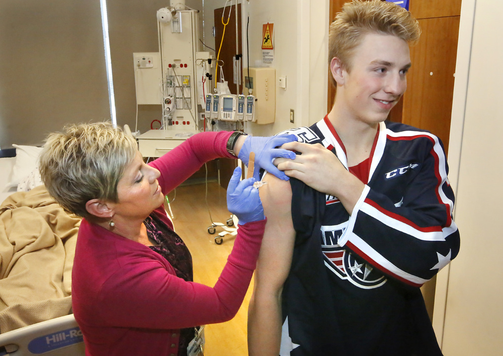 Flu shots the Americans way at Kadlec