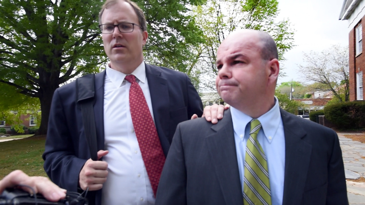 Agent pleads guilty to giving money to UNC football players