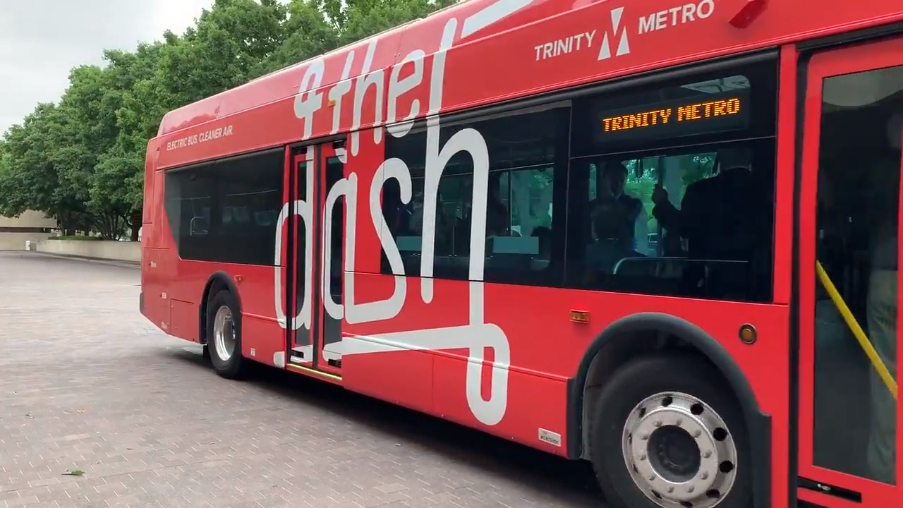 Why is a bright red, electric bus named ‘The Dash’ driving around Fort Worth?