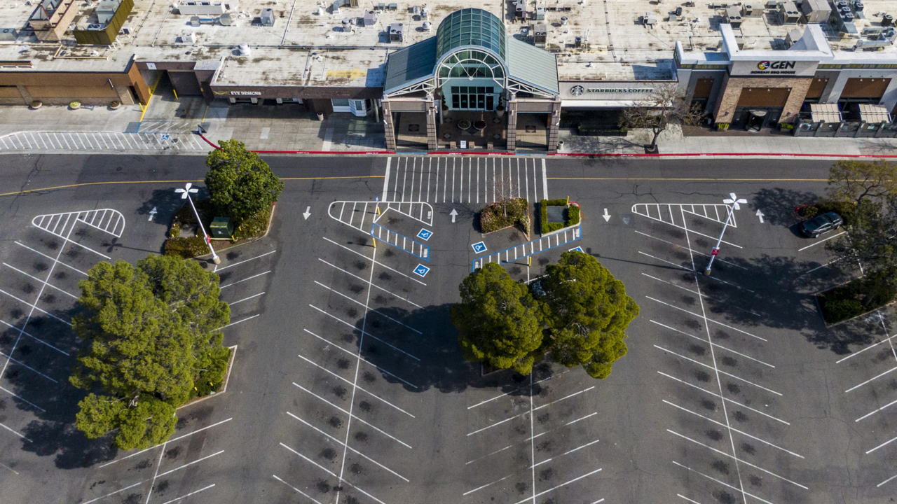 See drone video of near empty Arden Fair parking lot on first weekend of closure