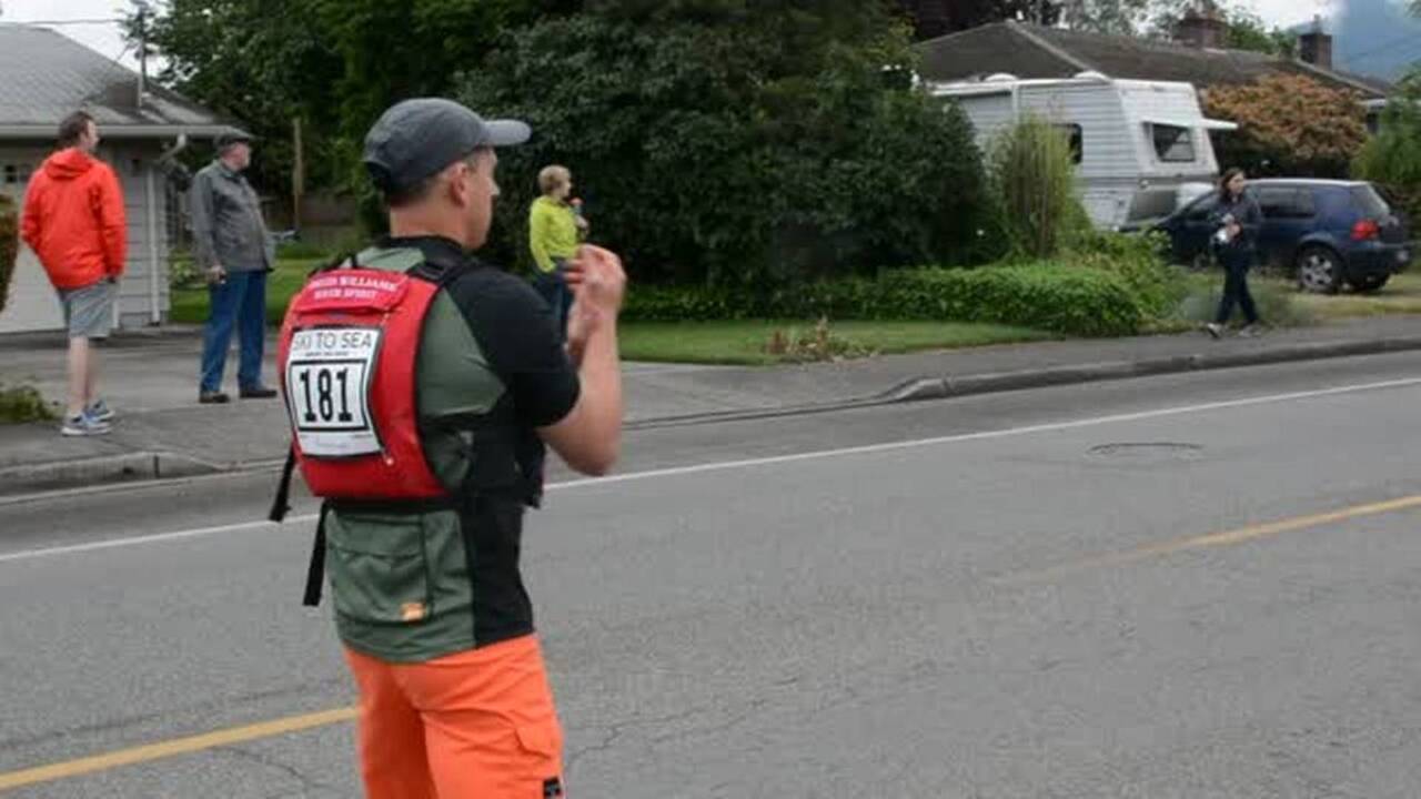 Ski to Sea racers hand off from road bike to canoe