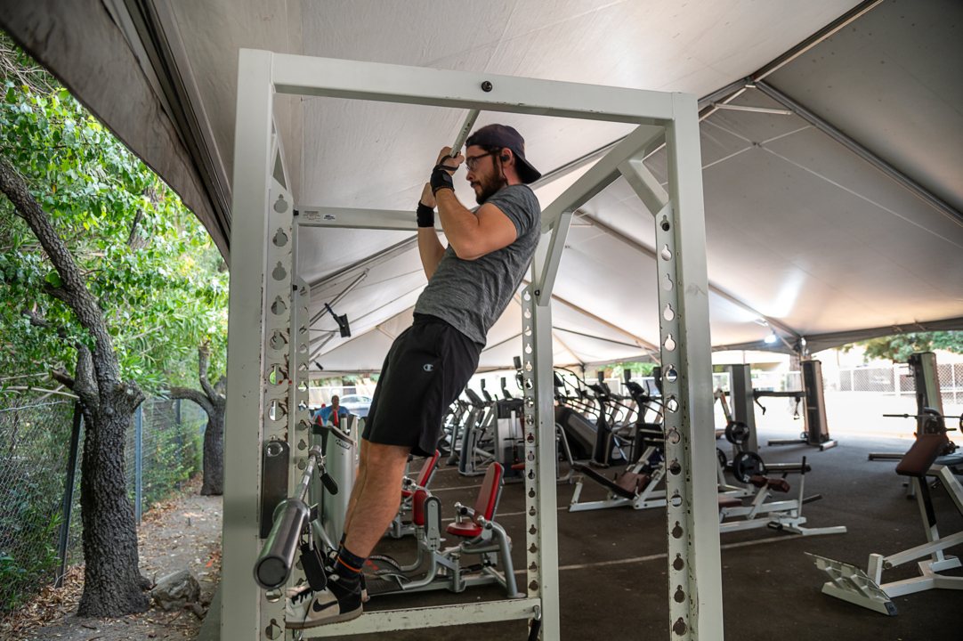 ‘Something about the fresh air.’ Gym members work out in makeshift outdoor gym amid COVID
