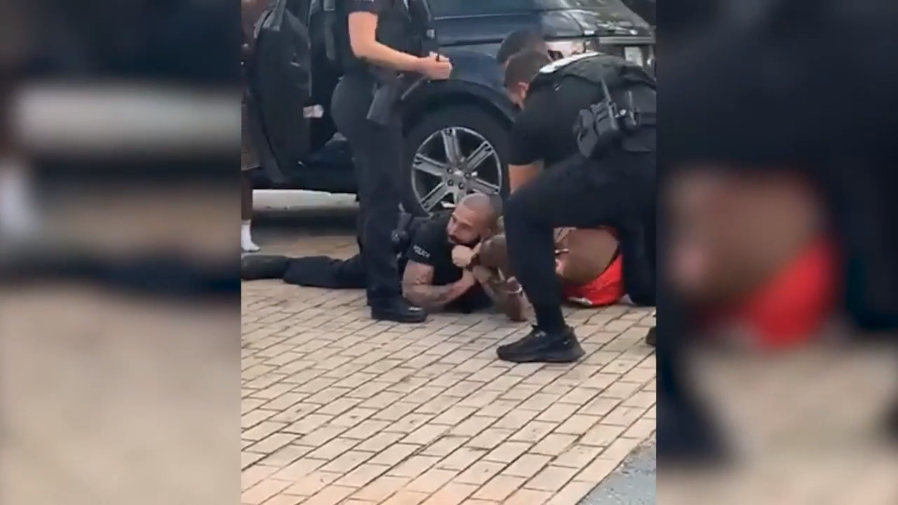 Miami police to investigate officer videotaped using headlock on man after traffic stop