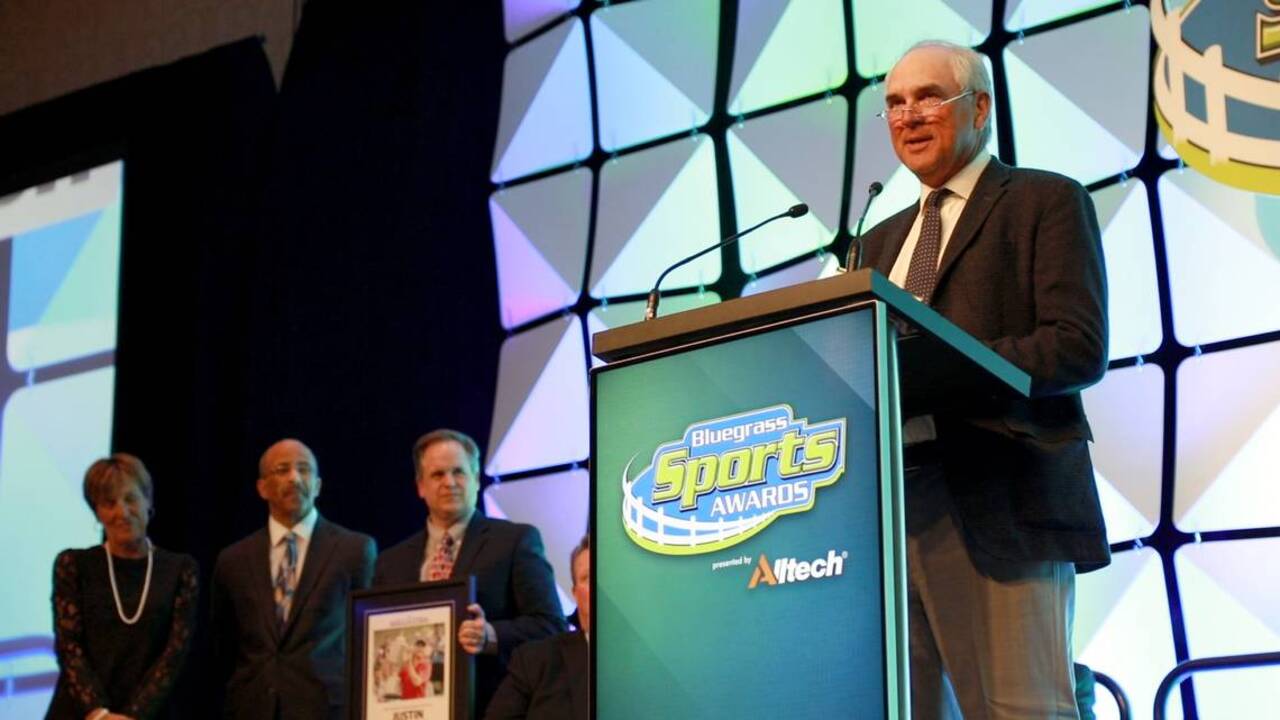 A proud parent accepts Justin Thomas’ award as 2017 Kentucky Sports Figure of the Year