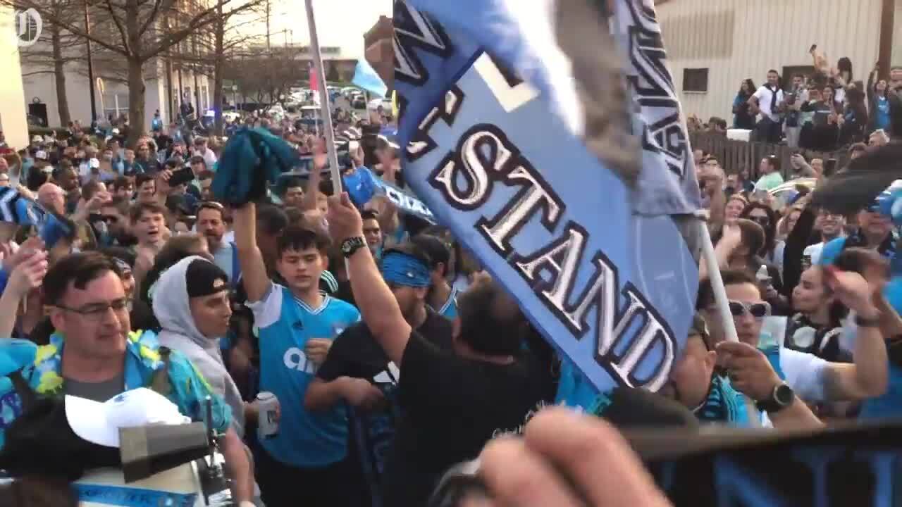 Charlotte FC fans celebrate on the streets