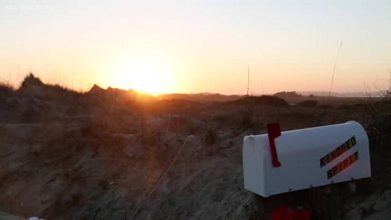 Why people have been leaving their life stories in this mailbox on a beach for 40 years