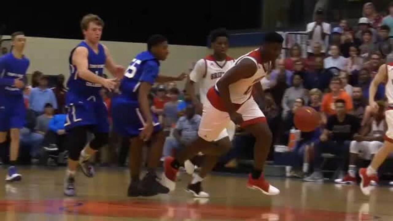 Zion Williamson dunks during semi-final game