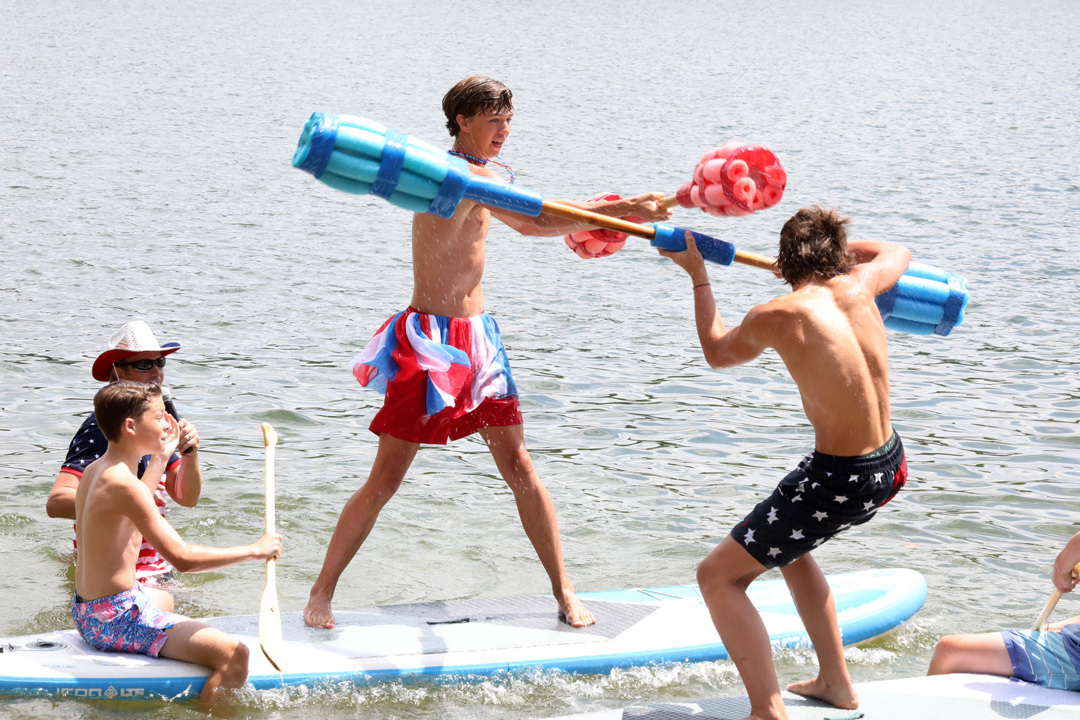 Water jousting part of 4th of July fun in Tega Cay
