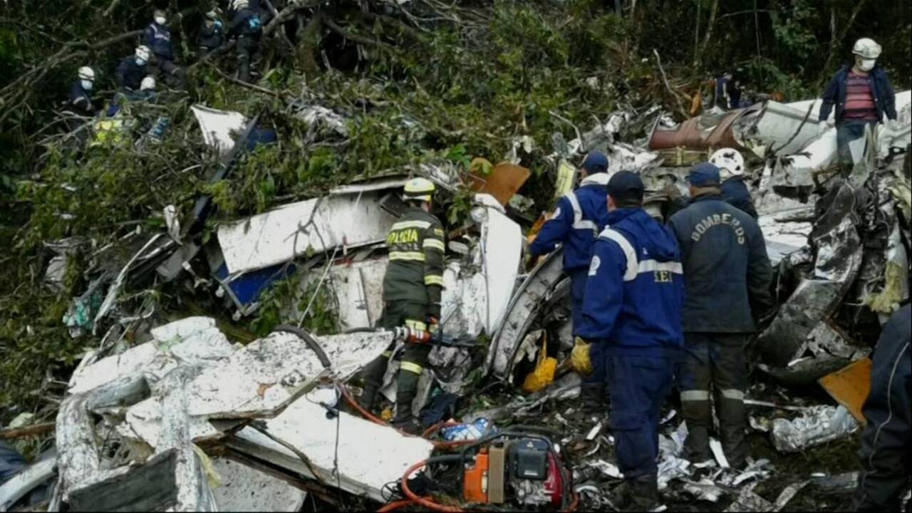 Injured Colombia plane crash victims carried away from site