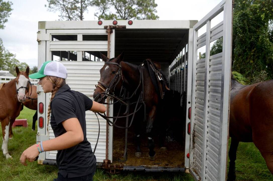 Yes, it rained — but big hats & tailgating shined at Bluffton charity polo match