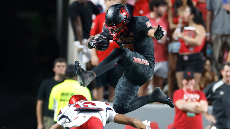 What a hurdle by NC State football's Davion Gause!