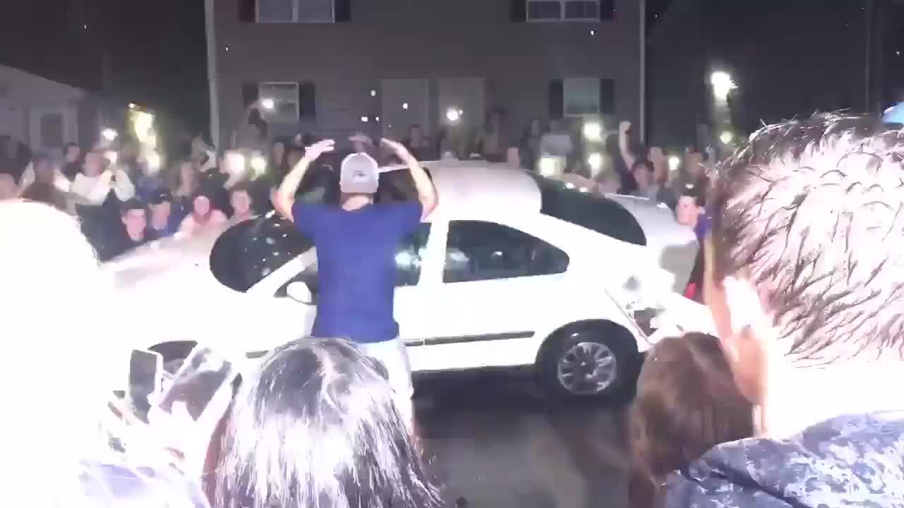 Kentucky students flip car after football team beats Florida for first time in 31 years