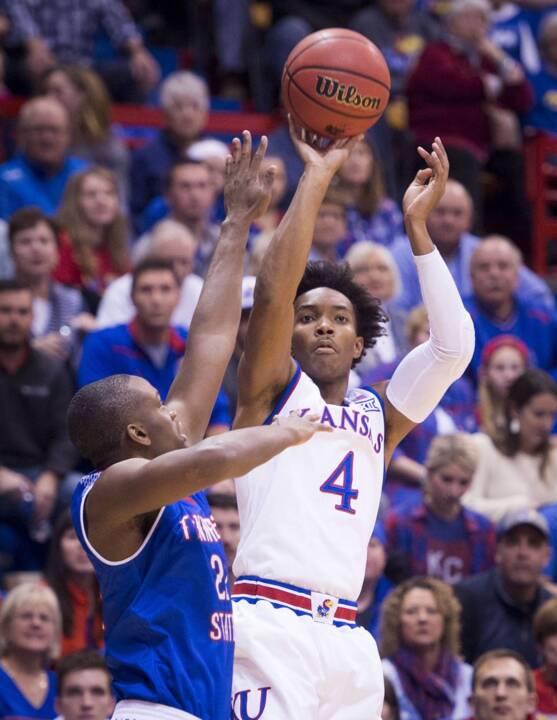Short-handed Kansas easily wins opener but a bigger challenge is next: Kentucky