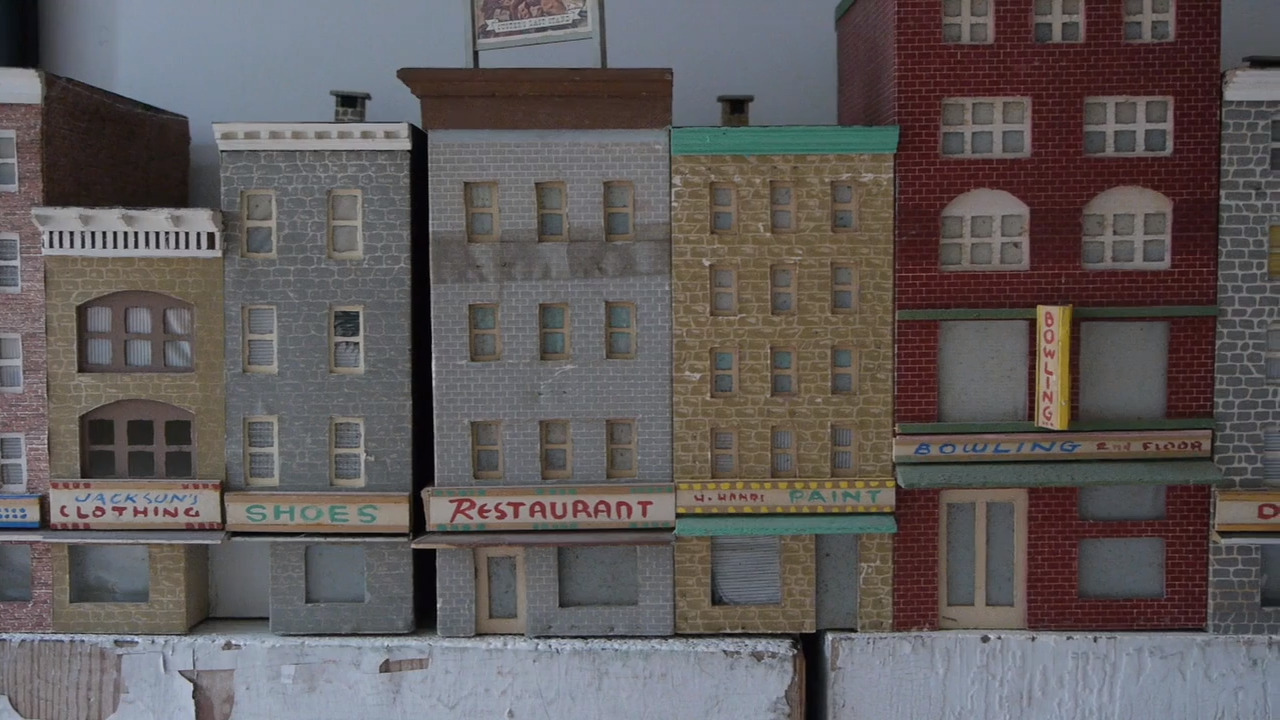 They've collected 1,200 tiny buildings inside their home. It's a very small world after all.