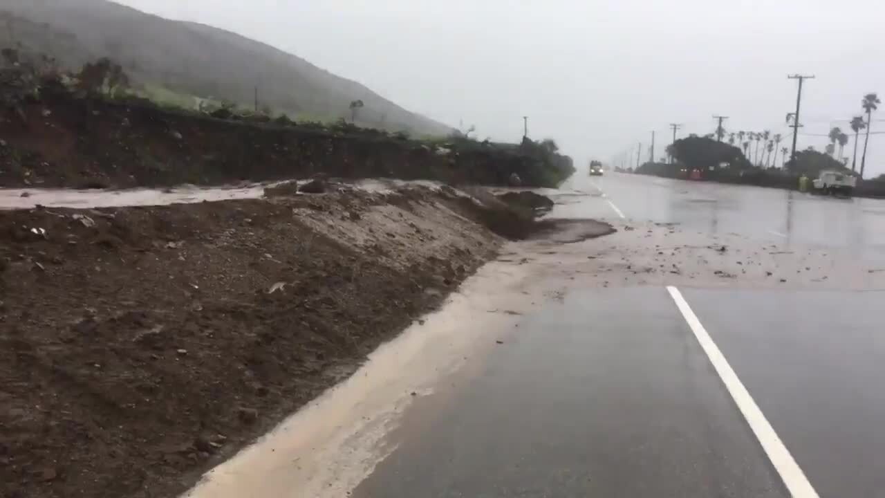 Deluge triggers rock and mud slides, closing roads in Woolsey fire area