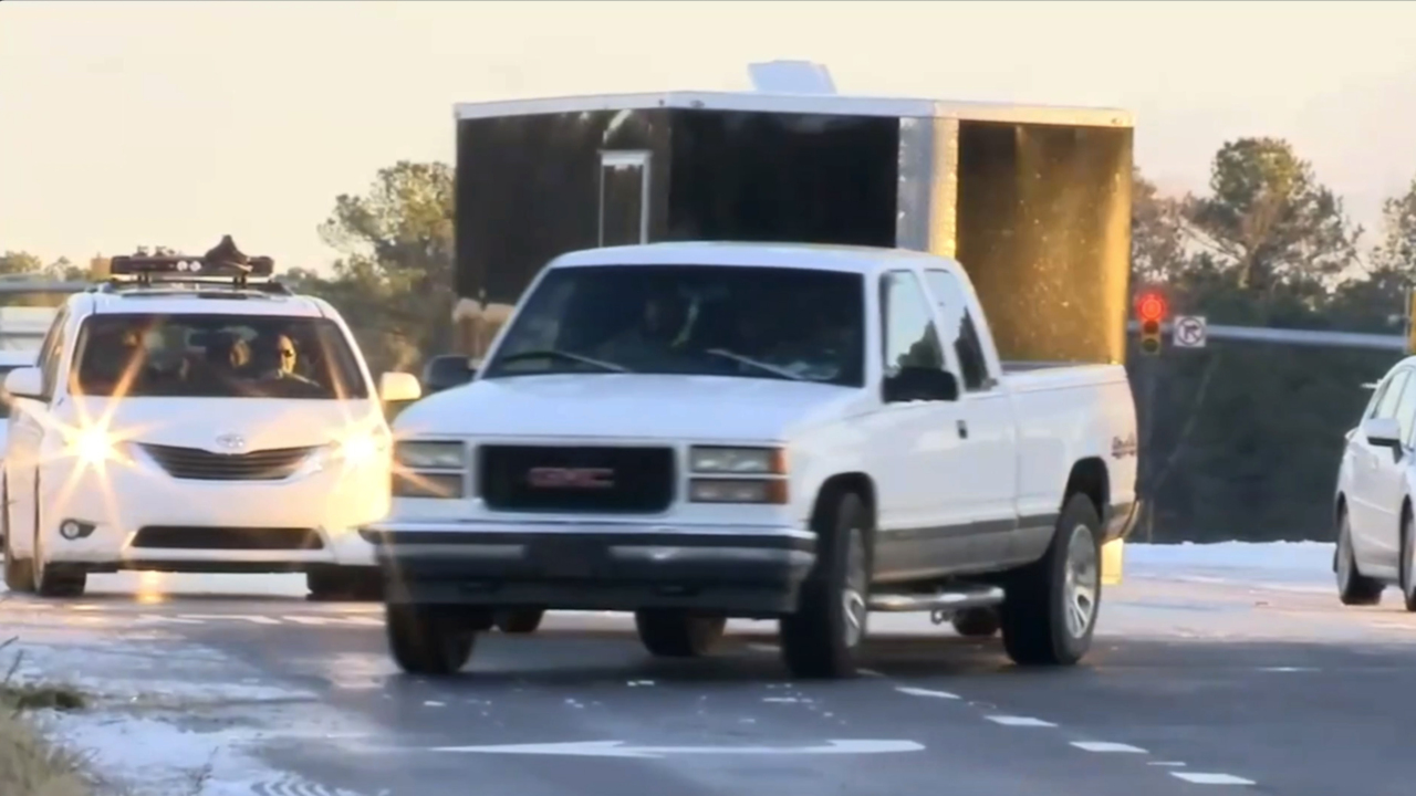 NC residents deal with power outages and slick, icy roads as winter storm lingers