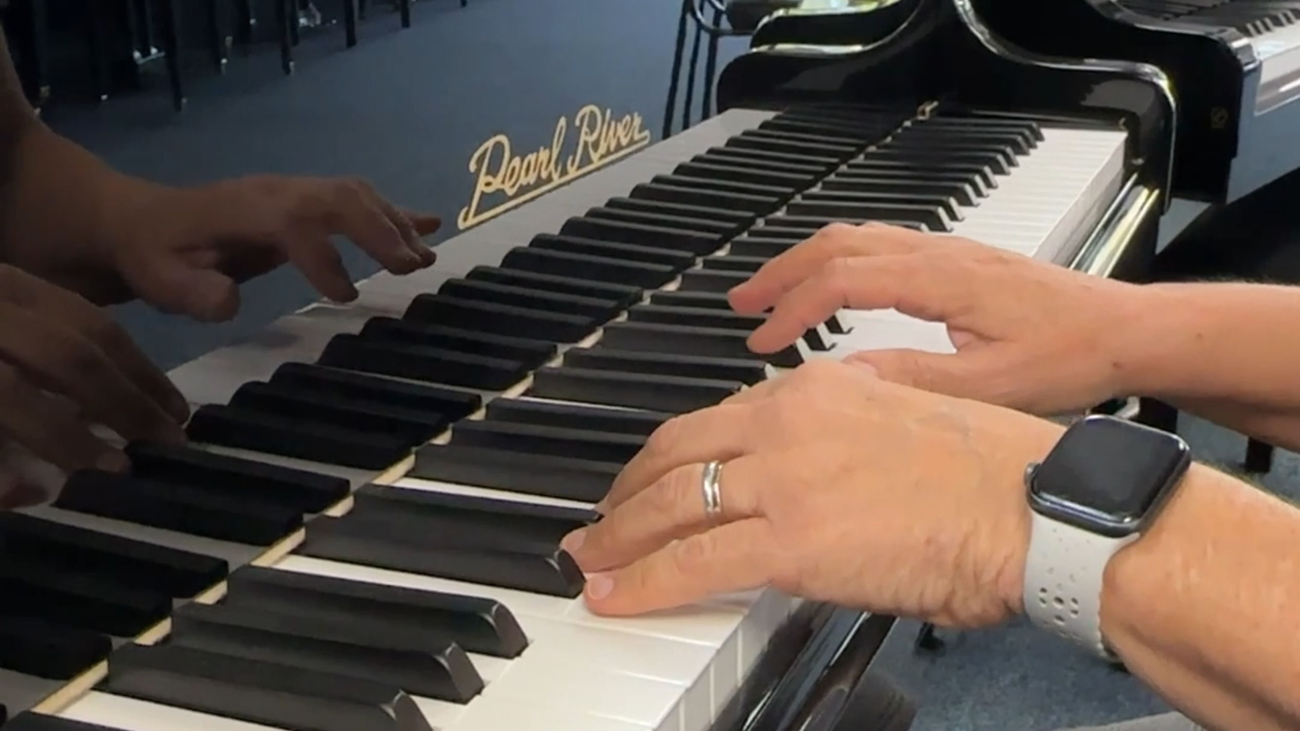 Dickerson's Tri-City Pianos celebrates with new owners