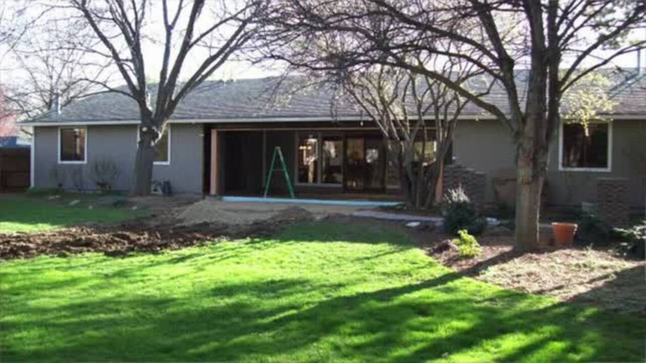Transforming a covered patio to an all-season sunroom