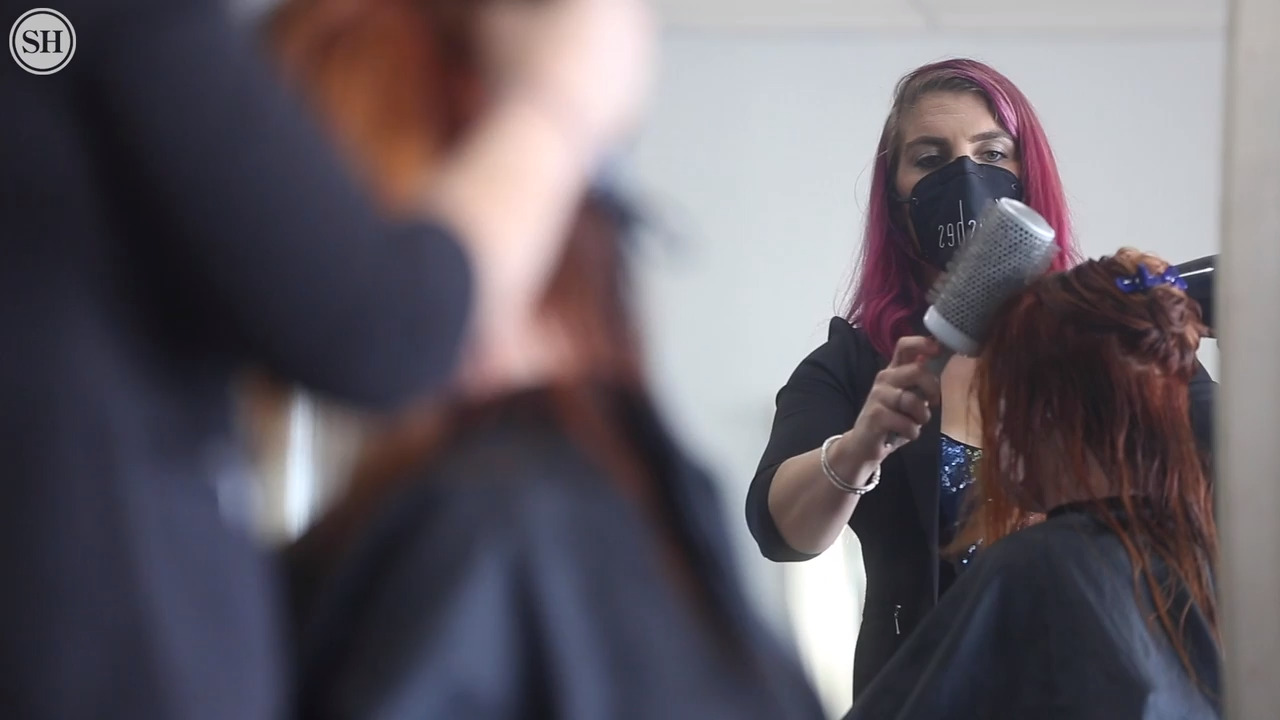 Back to ‘hairapy.’ Gulfport salon reopens with new precautions after COVID-19 closure.