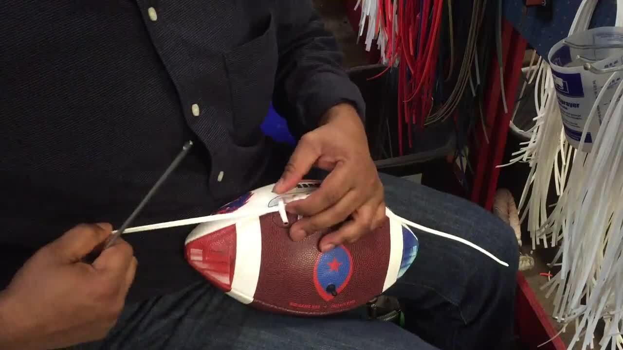 Watch a new football be laced at Big Game USA in two minutes