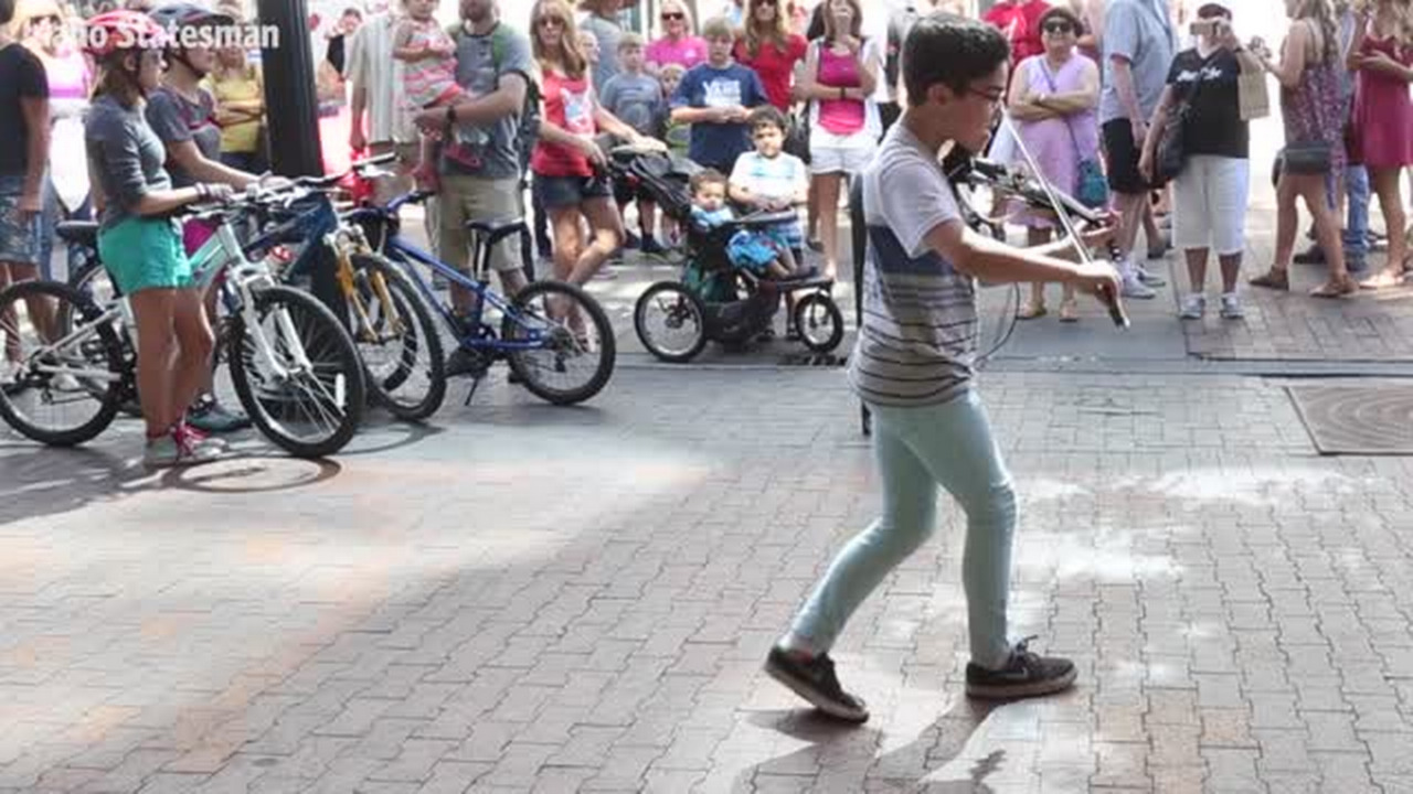 He dances and plays the violin at the same time. And he's good.