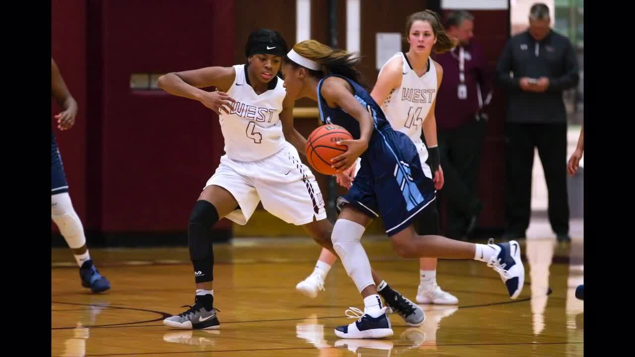 Belleville East girls defeat rival West