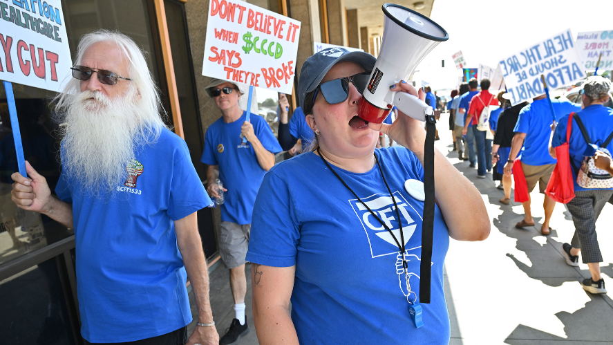Watch as union members protest outside SCCCD offices in downtown Fresno