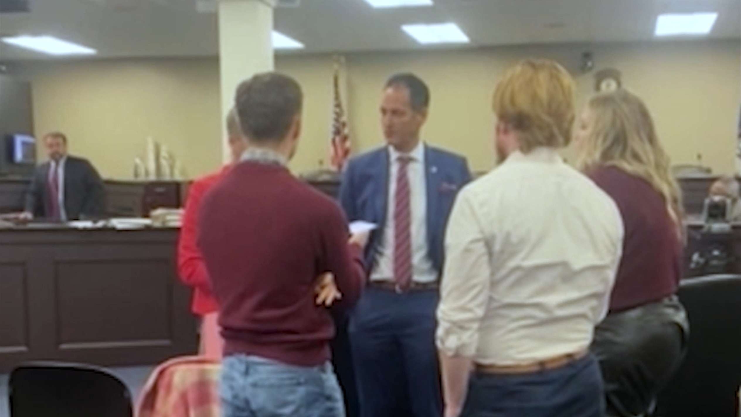 Rep. Daniel Grossberg interrupted by women after agreeing to settlement