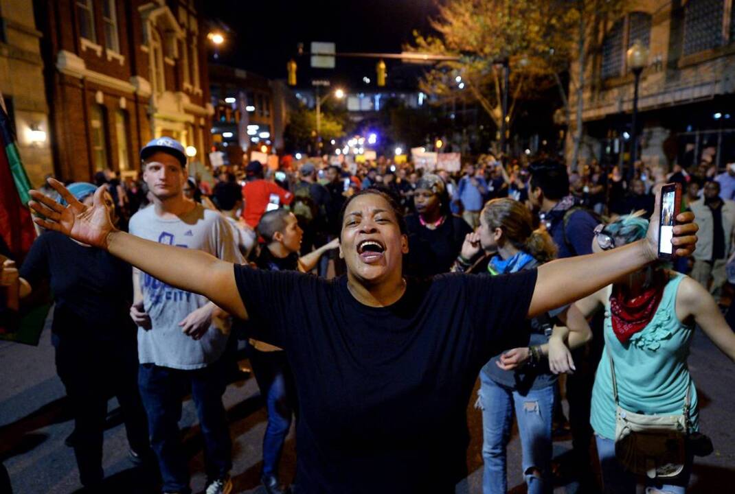 Staggered by protests, city regains its footing