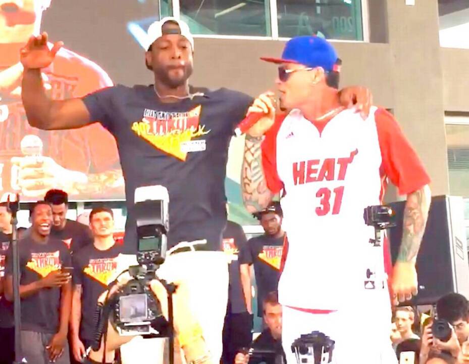 Dwayne Wade, with Vanilla Ice, bounces to 'Ice Ice Baby'