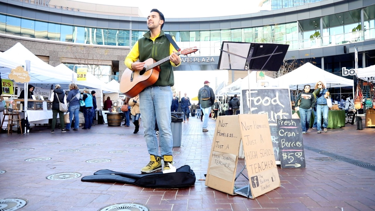 He’s a teacher and he busks on weekends. Here’s why.