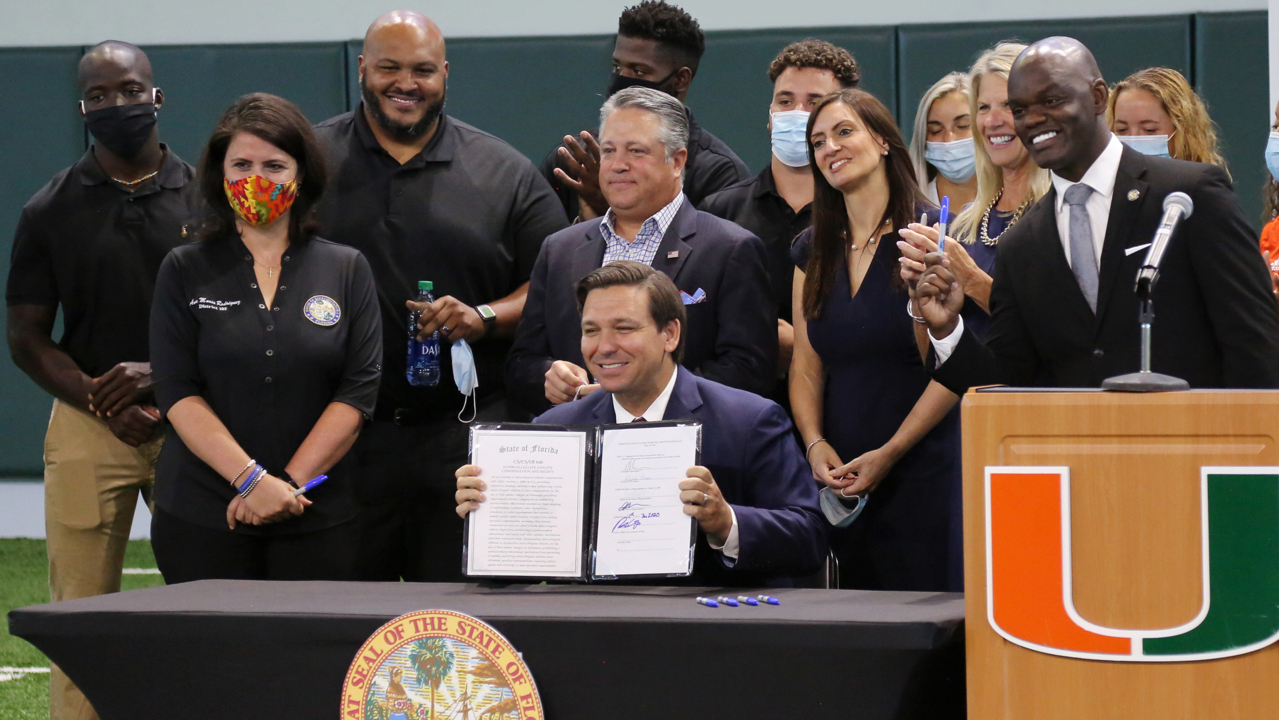 Gov DeSantis signs bill allowing college athletes in the state to profit off their name, likeness and brand