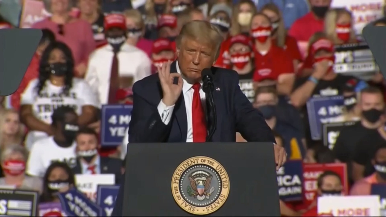 President Trump mocks coronavirus and Democrats in packed North Carolina speech