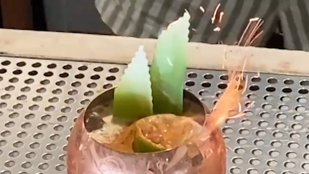 How to make the flaming tropical cocktail, Belladona, at Alchemists' Garden