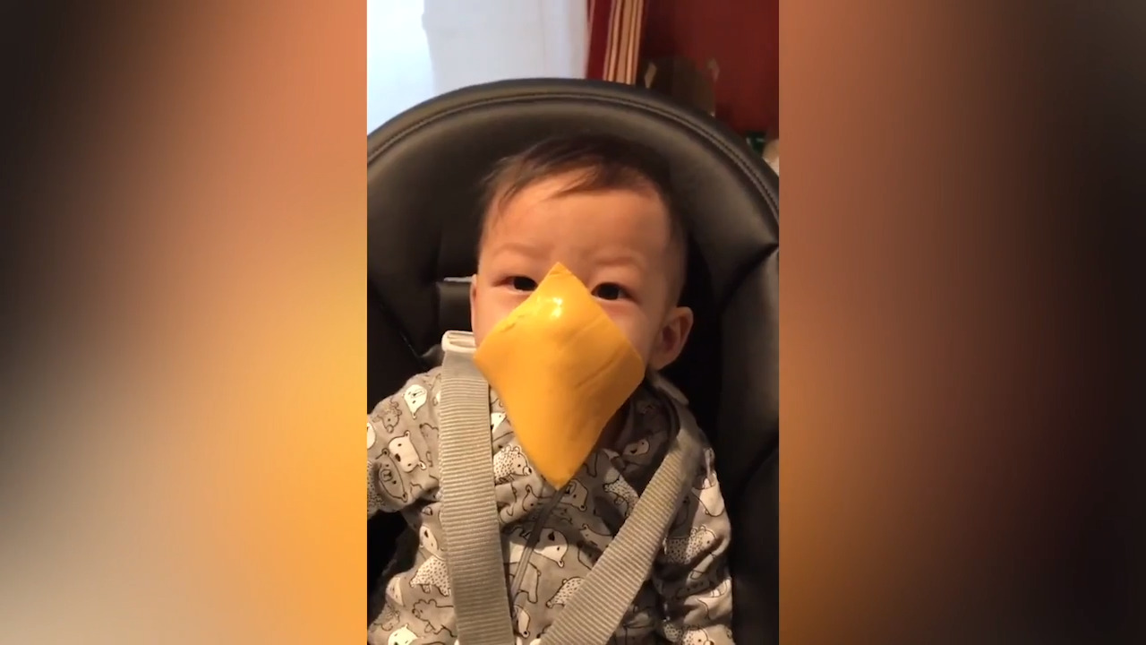 Adults fling cheese at babies as part of viral “cheese challenge”
